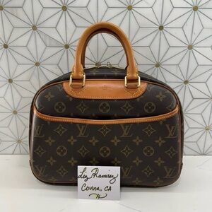 Louis Vuitton Brown trivoli Monogram hand bag
